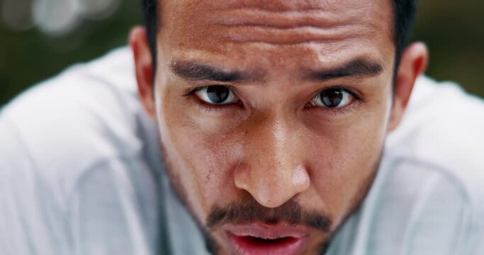 Nature exercise, face sweat and man tired after cardio running workout, marathon training or runner health lifestyle. Sports fatigue, portrait and breathing athlete focus on intense outdoor fitness