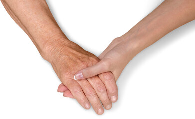 Young Woman's Hand Touching and Holding an Old Woman's Hand