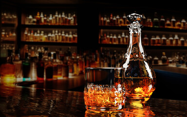 Whiskey or brandy, alcoholic beverages In transparent elegant bottle in Bar. Alcohol in clear glass on wooden floor table. Multiple wine bottles blur background On bar counter restaurant 3D Rendering