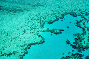 The heart reef, Aerial view of part of the Great Barrier Reef, the world's largest coral reef system composed of over 2,900 individual reefs and 900 islands. Coral Sea,  Queensland, Australia, 2019