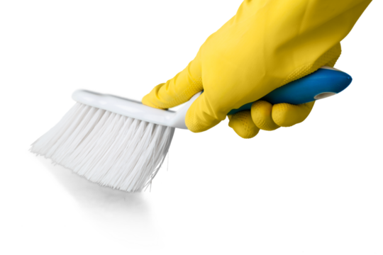 Yellow cleaning glove with a brus isolated on white background