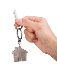 Hand Holding Metal House Key on white background