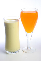 glass of juice and fruits