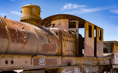 Fototapeta na wymiar Abandoned train at the Train Graveyard in the Bolivia Salt Flats.