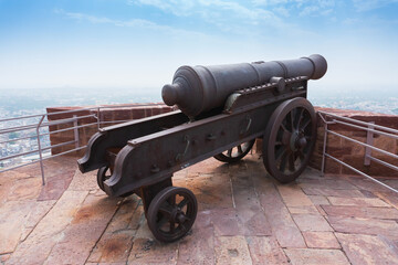 Jodhpur, Rajasthan, India - 17.10.2019 : Famous Kilkila cannons on the top of Mehrangarh fort. overlooking city of Jodhpur for proctection since ancient times. Huge long barrel is tourist attraction.