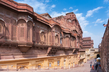 Fototapeta premium Jodhpur, Rajasthan, India- 17.10.2019 : Jhanki Mahal, for royal women to see royal possessions from the windows or Jharokha, stone window projecting from upper story wall, overlooking Mehrangarh fort,