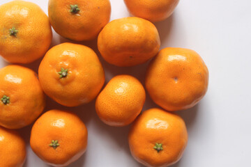 fresh citrus fruits containing vitamin C for health on a white background