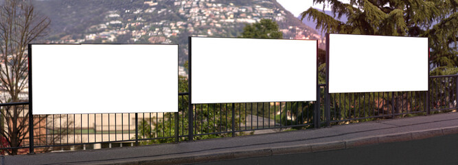 3 wide format white billboards on a street in Lugano, Switzerland.