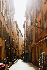 Narrow street in old town of Nice, France