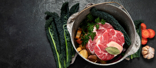 Metal spoon and food ingredients on dark background. Health cooking concept.