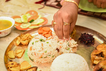 Traditional Bengali cuisine and food meal thali of West Bengal, India. Bengali food thali in...