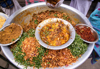 Street food Desicioues Masala chana bot/chola bot Special iftar item in the chawkbazar, dhaka-bangladesh