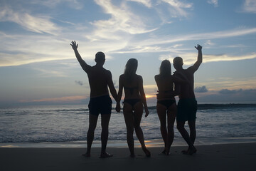 Fototapeta premium two young couples on vacation four people friends, happiness group person