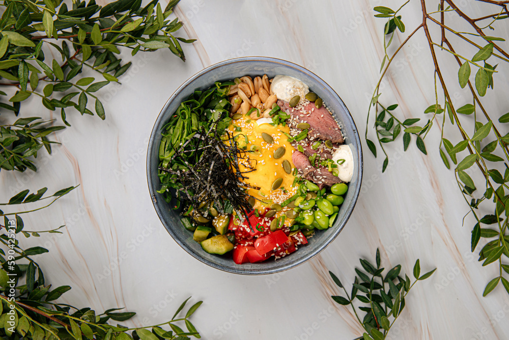 Wall mural Portion of gourmet poke bowl with beef pastrami vegetables - Wall murals