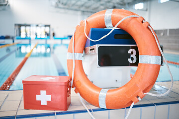 Swimming, equipment and first aid at a pool for security, safety and emergency. Healthcare,...