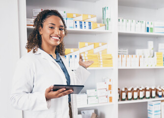 Digital tablet, portrait and woman pharmacist in a medication dispensary at the medicare clinic. Happy, smile and female pharmaceutical healthcare worker with a mobile device by medicine in pharmacy.