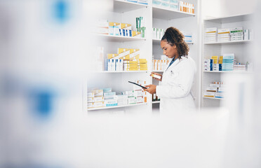Naklejka na ściany i meble Tablet, stock and medicine with a woman in a pharmacy to fill an online order of prescription treatment. Medical, product or insurance with a female pharmacist working as a professional in healthcare