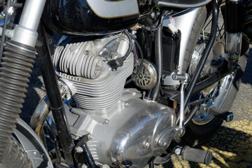 Antique motorcycle engine close up detail background