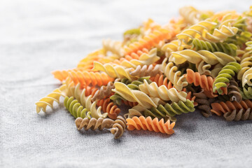 A variety of fusilli pasta made from different types of legumes, green and red lentils, mung beans...