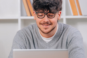 student working with computer or laptop