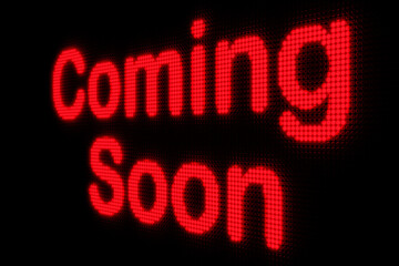 Coming soon. Dark LED screen with the text "Coming Soon" in red glowing letters. Announcement message, infographic, opening event, information, business, premiere  and advertising. 3D illustration