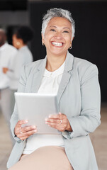 Happy, corporate and portrait of a woman with a tablet for an email, communication or internet. Smile, mature and an executive manager working on technology at a company for research and the web