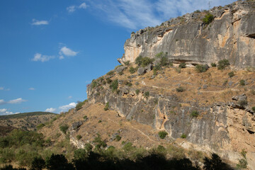 Fototapeta na wymiar Climbing Wall and Landscape, Panton de la Oliva Reservoir, Patones, Madrid, Spain
