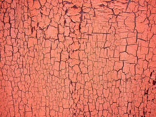 Old red paint on the wall. Vintage texture