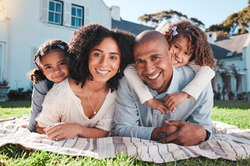 Family, children and parents portrait outdoor in backyard for love, picnic and care. Happy kids, man and woman together for support, peace or quality time with a hug and smile for security or holiday