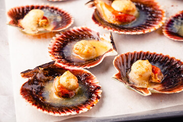 Cooked scallops with melted butter