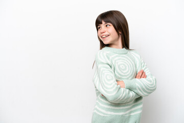 Obraz premium Little caucasian girl isolated on white background looking to the side