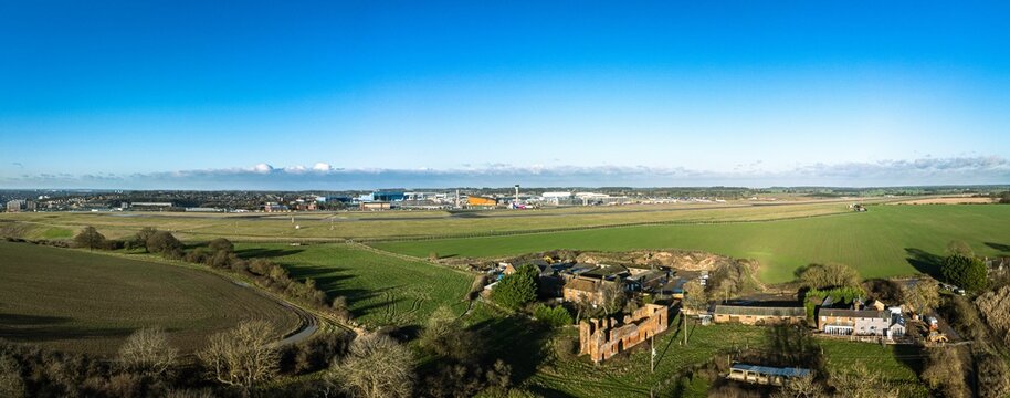 Panorama of a beautiful landscape with Someries Castle and Luton Airport