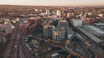 Aerial view of the Gasholder Park at sunset in London, UK