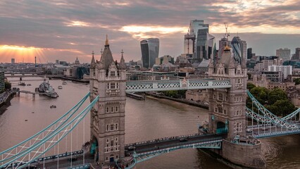 Fototapeta premium Aerial view of Tower Bridge at pinky dreamy sunset in London