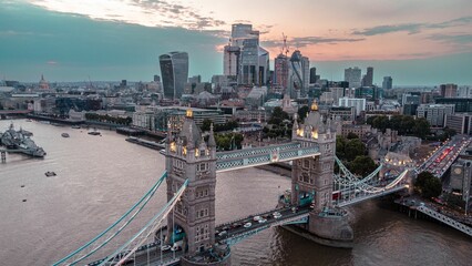 Aerial shot of the Tower Bridge over river Thames at sunset © Demetrios Vassiliades/Wirestock Creators