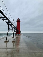 Landscape view of the Grand Haven Lighthouse and pier in lake Michigan, USA