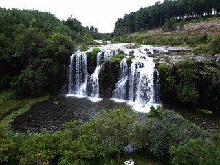 Landscape view of Forest Falls with cloudy sky in background, Sabie, South Africa
