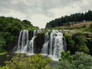 Fototapeta na wymiar Landscape view of Forest Falls with cloudy sky in background, Sabie, South Africa
