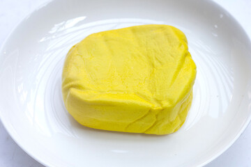 Yellow tofu on white background.