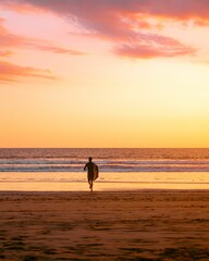 Vertical shot of a traveller on the beach during sunset