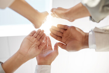 Business people, hands and high five for collaboration, meeting or teamwork together at the office. Hand of employee group touching for team agreement, coordination or solidarity at the workplace