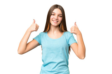 Teenager girl over isolated chroma key background giving a thumbs up gesture