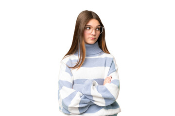 Teenager girl over isolated chroma key background keeping the arms crossed