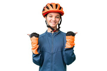 Teenager cyclist girl over isolated chroma key background with thumbs up gesture and smiling - obrazy, fototapety, plakaty