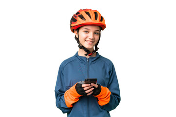 Teenager cyclist girl over isolated chroma key background sending a message with the mobile