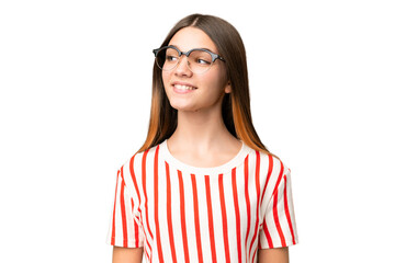 Teenager girl over isolated chroma key background With glasses with happy expression