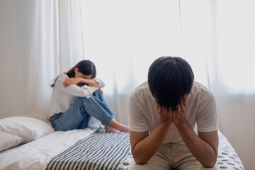 The husband is unhappy and disappointed in the erectile dysfunction during sex while his wife sleeping on the bed. Sexual Problems in Men, The concept of erectile dysfunction according.