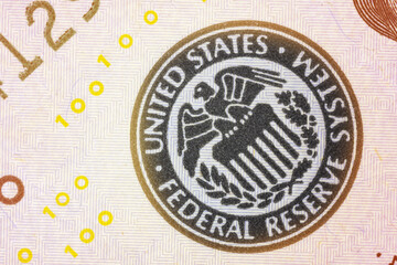 American Federal Reserve sign on one hundred dollars banknote, close-up