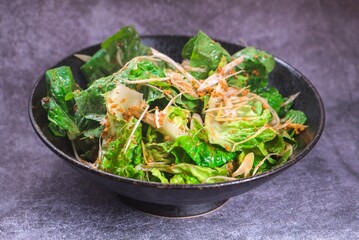 Close-up shot of a salad with lettuce in a bowl