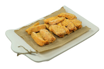 Frozen breaded orange chicken nugget sticks texture in the market fridge. Home cooking. Fast food. Close up.